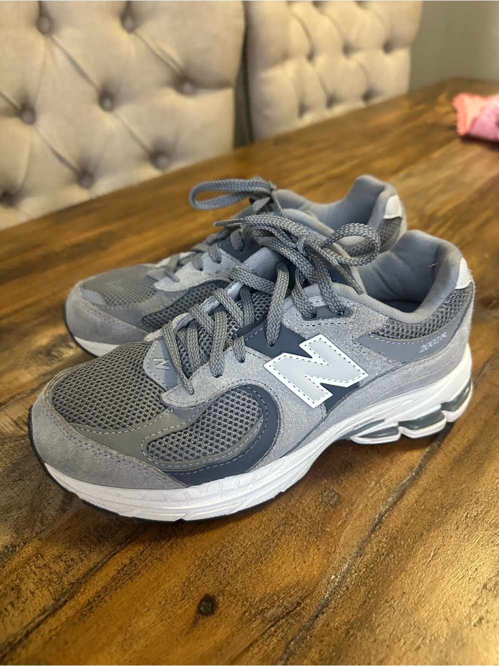 New Balance Kids Gray and White Sneakers